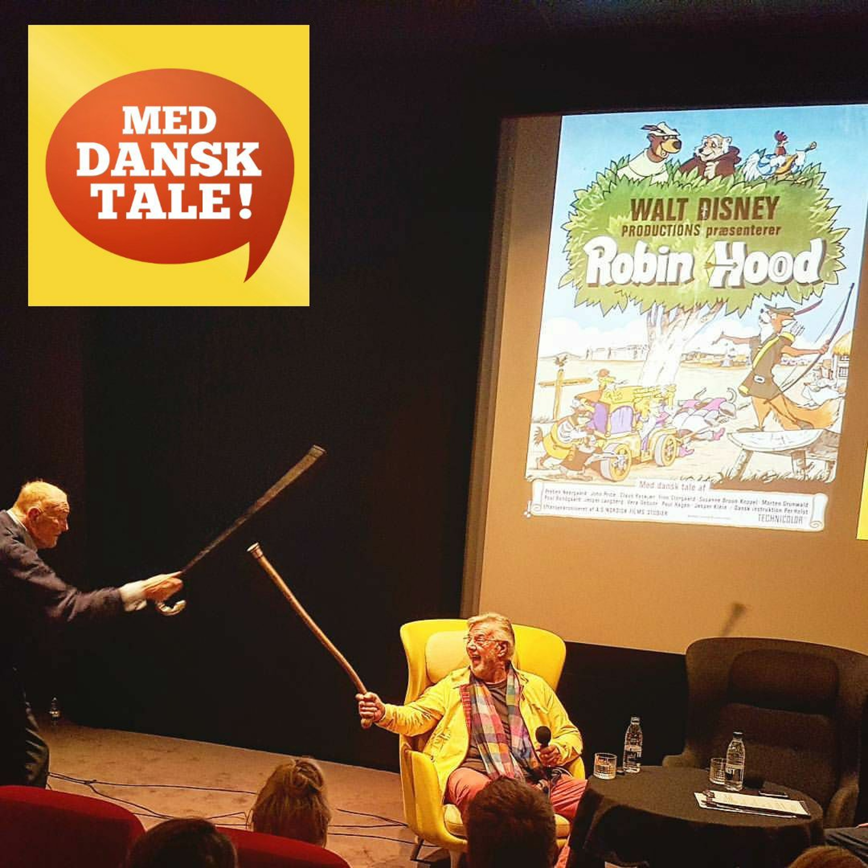 Med dansk tale