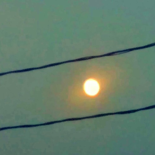 Moon Between Two Wires