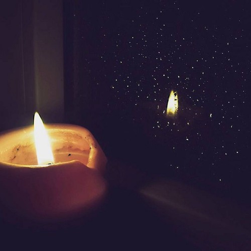 On the floor of the shower.