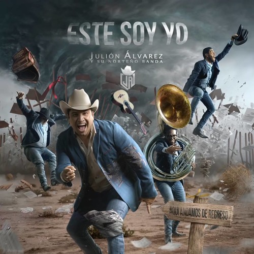 Julion Alvarez and Alfredo Olivas performing live at a concert
