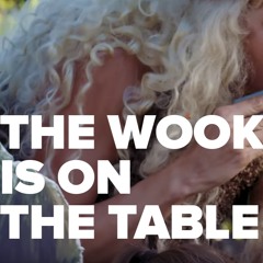 THE WOOK IS ON THE TABLE