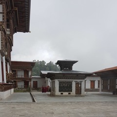 Buddhist Monks praying at the Dramitse Lhakhang in Mongar, Bhutan