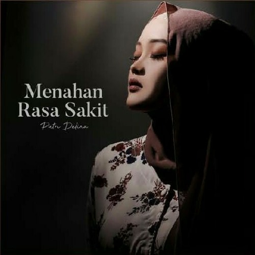 Menahan Rasa Sakit - Putri Delina