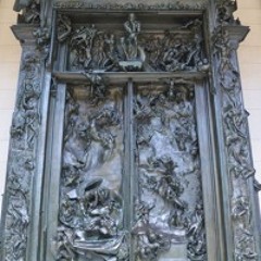 STANDING AT THE GATES OF HELL