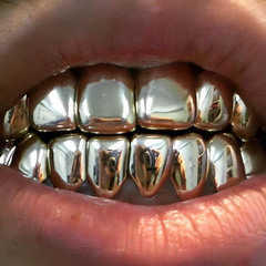 DENTE DE OURO