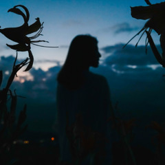 Alyas - Holding a Feather