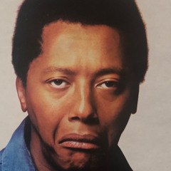 labi siffre is practicing in the apartment next door