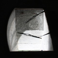 at the bottom of the v-neck