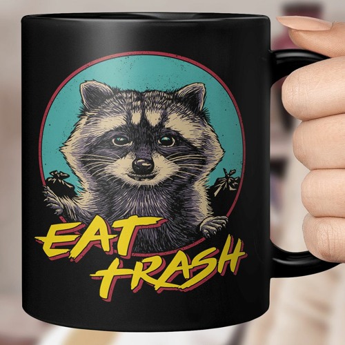 Raccoon eat trash mug