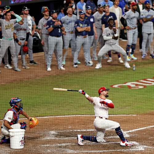 MLB: All Star-American League at National League. Jul 15, 2025; Cumberland, Georgia, USA; National League designated hitter Kyle Schwarber (12) of the Philadelphia Phillies hits a home run in the swing off of after the 2025 MLB All Star Game ended in a tie at Truist Park. Mandatory Credit: Jordan Godfree-Imagn Images