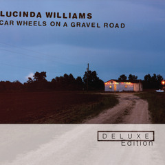 Car Wheels On A Gravel Road