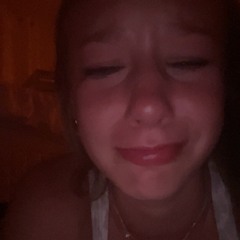 probably crying over a boy