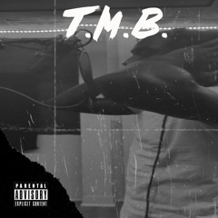 T.M.B.