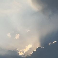 Sunlight breaking through the grey