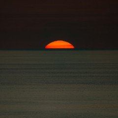 Sun Behind The Sea
