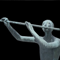 Blowing An Ancient Flute