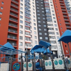Saint Petersburg, South-West, Children's Playground surrounded by skyscrapers, May 17, 2021