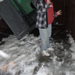 Death Of A Bachelor Cover In A Small Apartment Bathroom