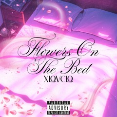 FLOWERS ON THE BED
