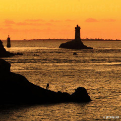 Sunset at the end of the world Beg Ar Raz  with JOKER- Pointe du Raz - Lighthouse Faro Storm Ouessant ENEZ EUSSA