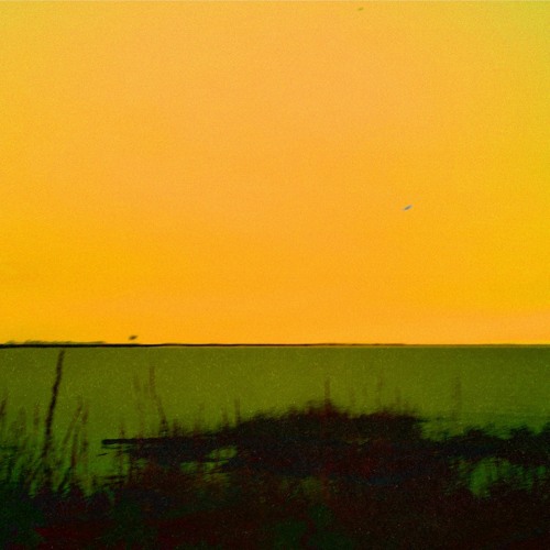 On Planets - The beach at the base of the hill