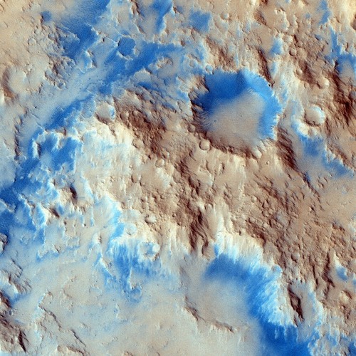 Sinuous Ridge Materials in Reuyl Crater