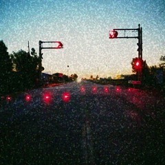 standing at the railway crossing lights