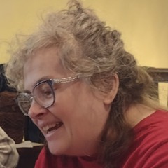 Columbia poet and fiber artist Ann Youmans walking the dog