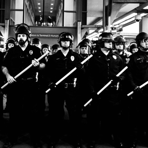 “LOCK ‘EM UP!” A music of PROTEST in “4 against 5” for 18 percussionists....