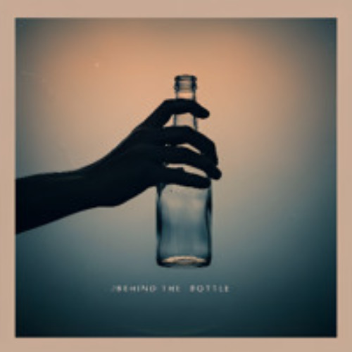 Behind a Bottle