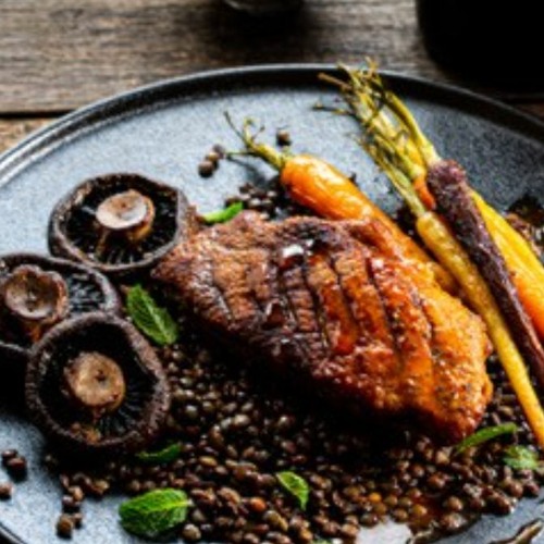 Stream Redacted - Crispy duck breasts with orange and red wine sauce