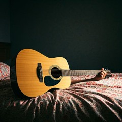 Guitar in my bed