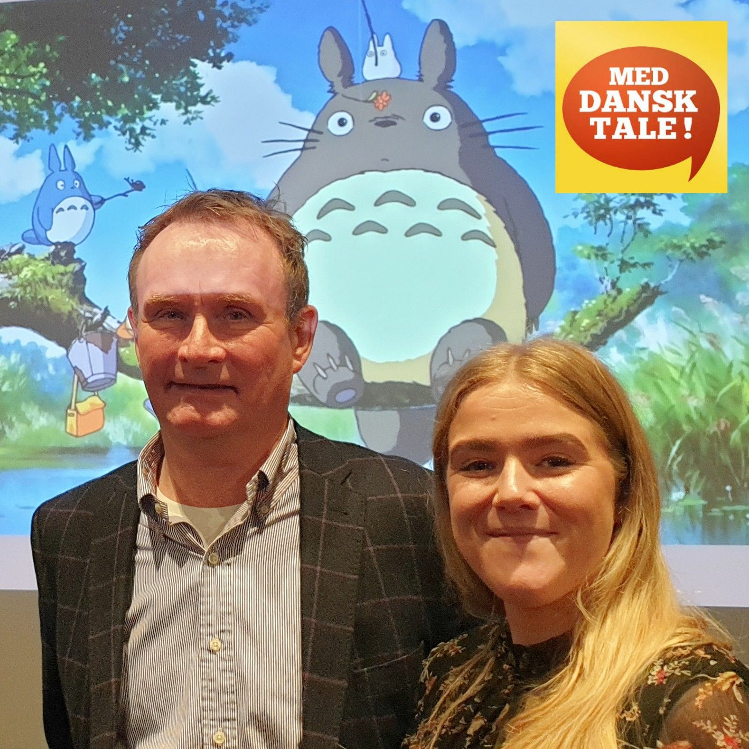 Med dansk tale