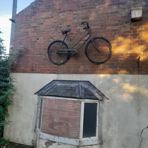 Bicycle On The Wall