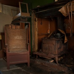 Wooden chair on flag stone floor (KIR16)