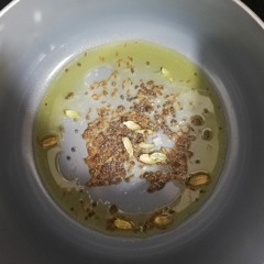 Popping mustard seeds and frying onions