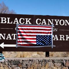 Protestors demonstrate at the Black Canyon against firings at federal land management agencies