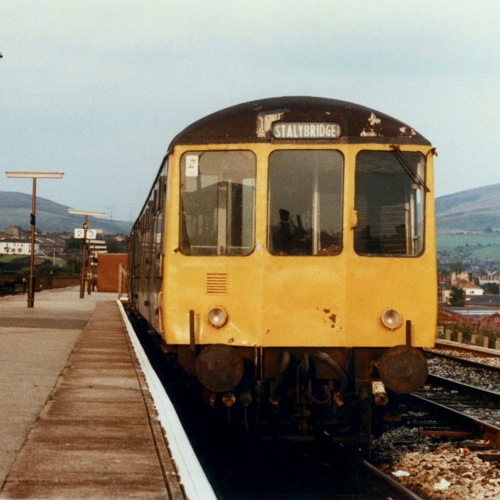 Stream class 104 2 car dmu 53451 53518 leaves stalybridge on a local