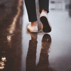 Stepping On The Rainy Street