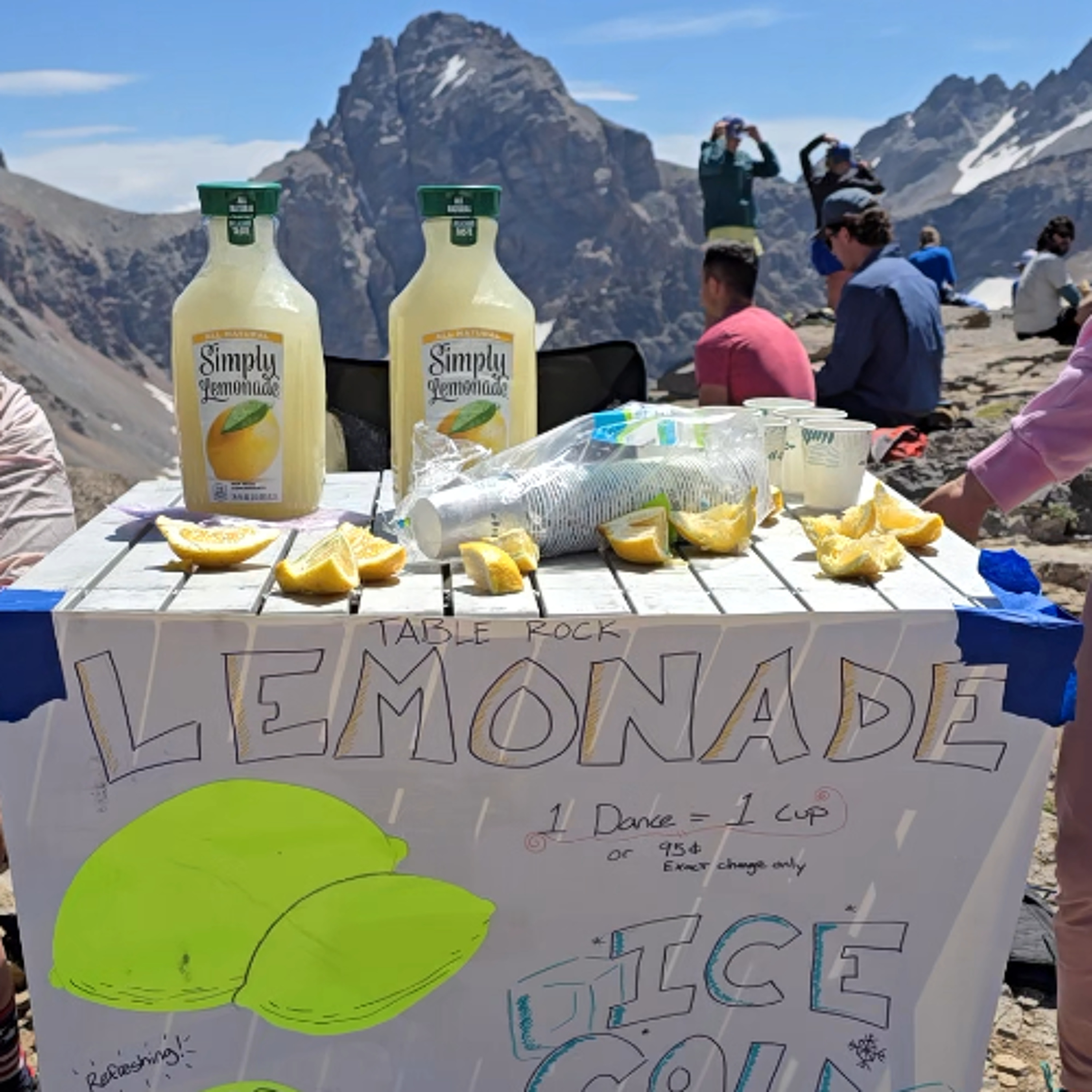 Families share lemonade on top of Wyoming's Table Mountain episode artwork