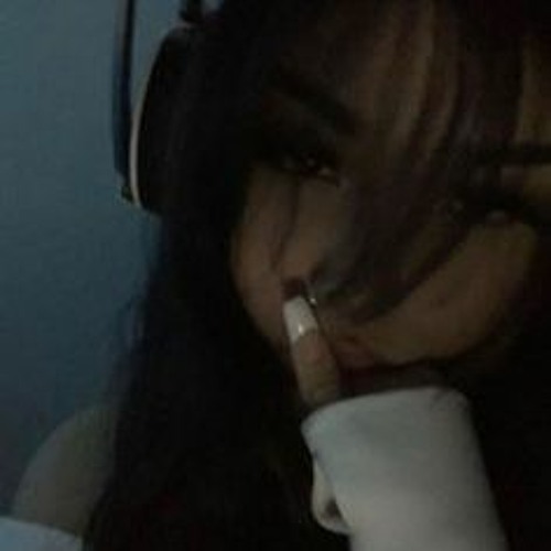 L.e.d on in the dark sitting on your bed with air pods in on max volume