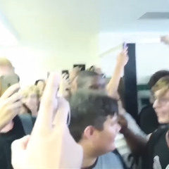 80 dudes singing the halo theme in a school bathroom