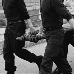 Dressed In Black Uniforms