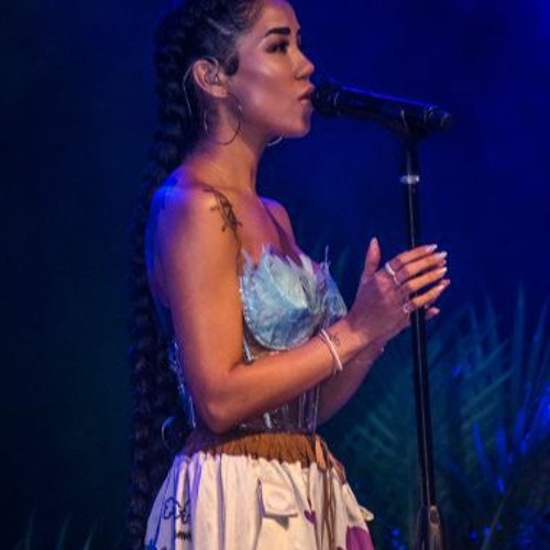 jhene aiko blue dress The one and only Jhene Aiko in @jacquemus! Shop this La Robe Bauhinlha dress now at Galeries Lafayette Doha. contact our client experts on our business whatsApp number: 44473404 and have