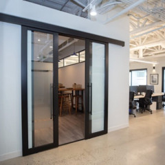 Redefining Canadian Workspaces with PC350 Sliding Door Solutions