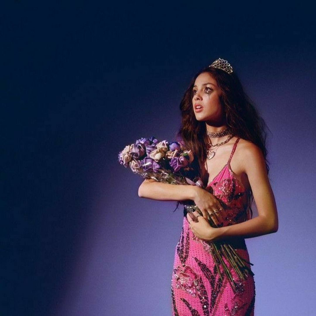 olivia rodrigo purple dress sour tour olivia rodrigo bringing the prom dress back for the 1 year anniversary of sour prom is iconic