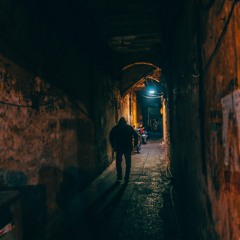 Footsteps In A Dark Alley