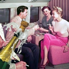 Alice, Fred and Kate, sipping Champange on a Plane