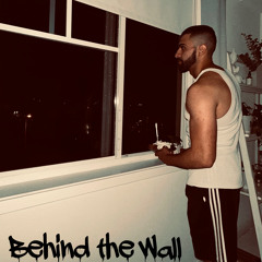 Behind the wall