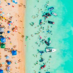 sippin palomas on a beach in ibiza